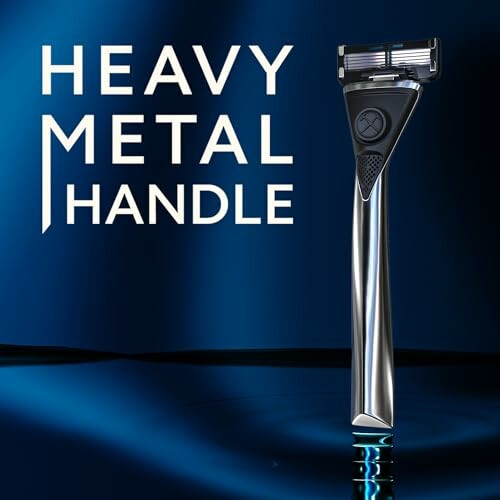 Shiny razor with heavy metal handle on blue background