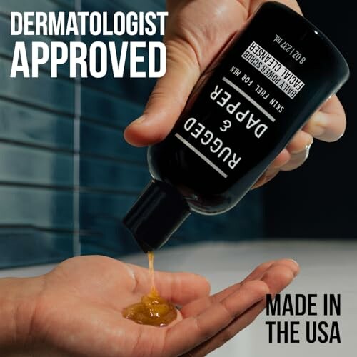 Hand applying Rugged & Dapper skin fuel with dermatologist-approved label.