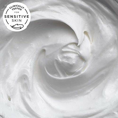 Swirl of white cream labeled for sensitive skin