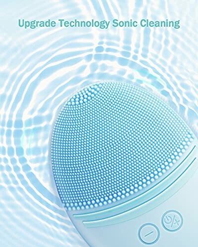 Sonic facial cleansing brush on water surface