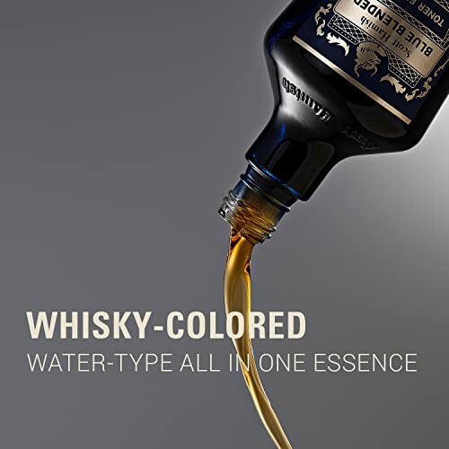 Bottle pouring whisky-colored essence.